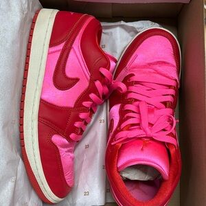 Pink and red jordans